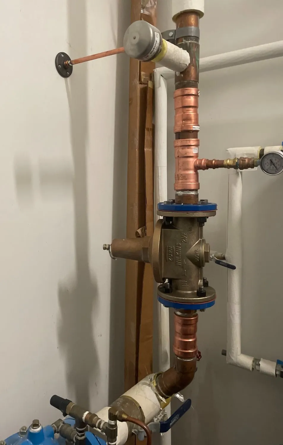 A clean copper repipe with a new water pressure regulator, installed by Good Times Plumbing