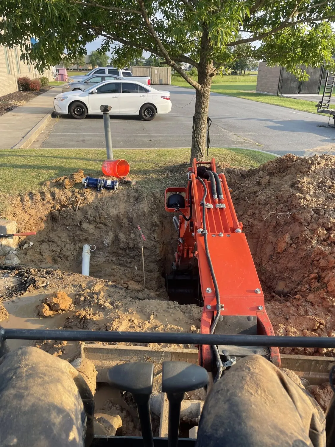 A Good Times Plumbing job site excavated to repair a water main in a central Arkansas yard